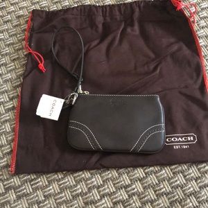 NEW! Brown solid print coach wristlet